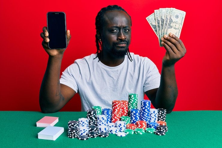 Smartphone displaying live football match with betting markets and statistics
